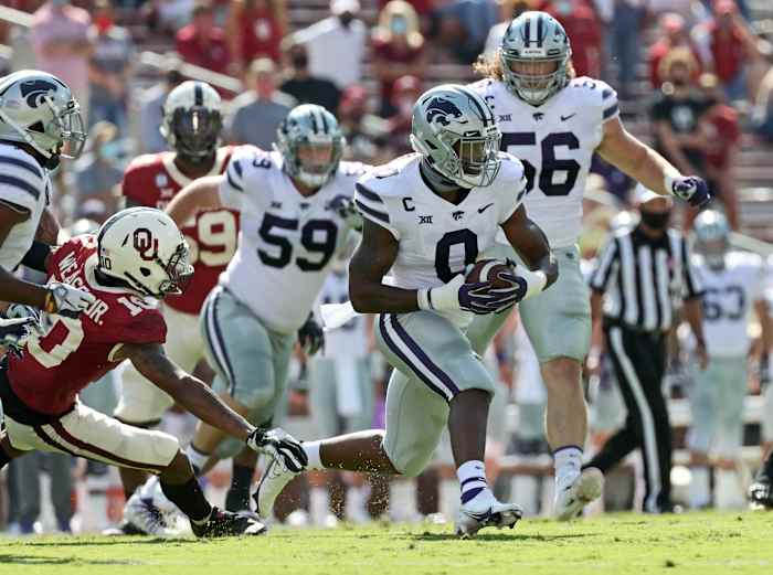 Elijah Sullivan runs with his interception